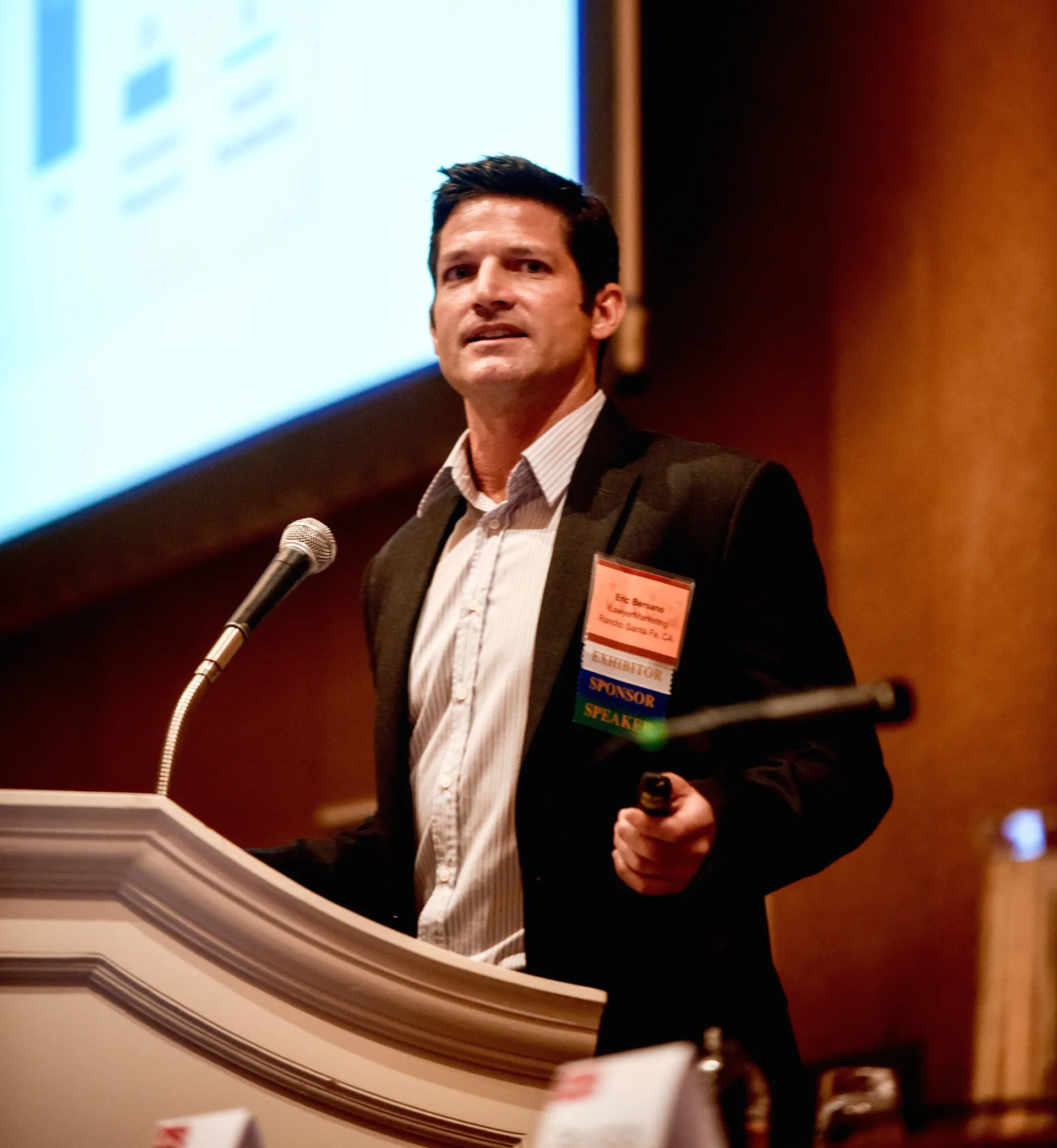 Eric Bersano speaking at a marketing conference